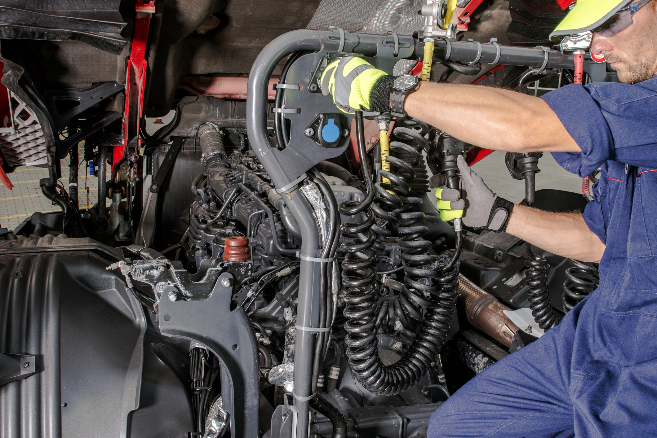 Semi Truck Mechanic Doing His Job